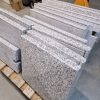 Vasalt műkő fedlap 5-7 cm vastag, vízorral 55 cm szélességig szürke fekete